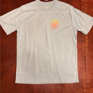 Huk Men's Light Blue Tee with Orange Graphic